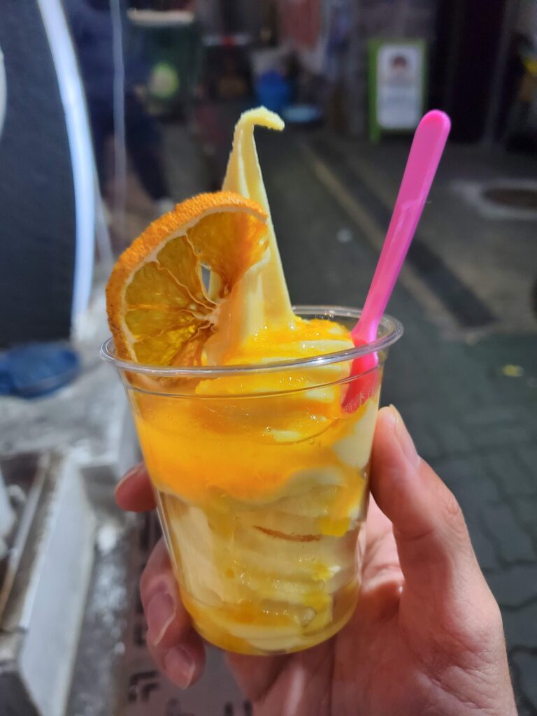 Hallabong Ice cream sundae from a stall in Dongmun Market on Jeju Island