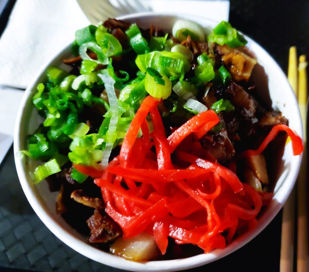 The mini chasu bowl at Zabon's Ramen which includes cubed chasu, green onion, ginger, and rice.